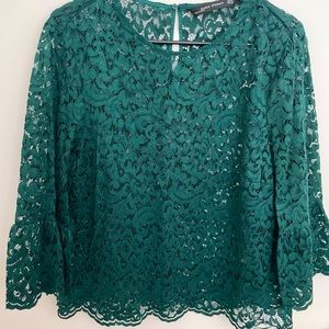 Zara top. Dark green with peplum sleeves. Great for work, brunch, or dates.